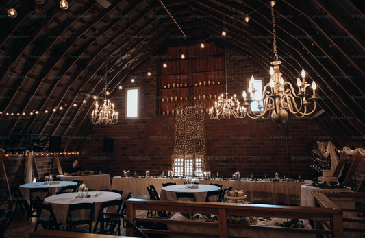 The “Moody Luxe” Trend: Deep Tones, Velvet Textures & Dramatic Lighting